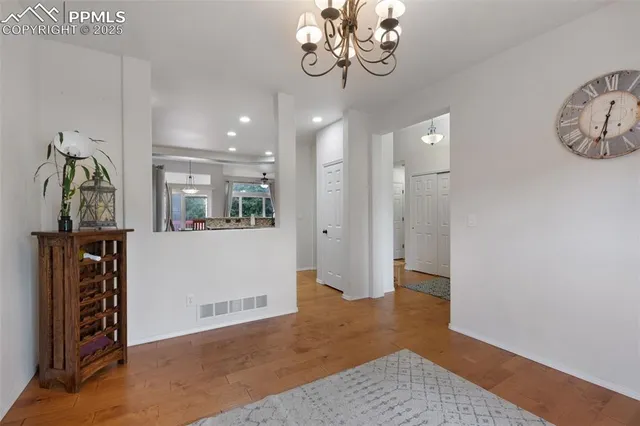 a view of an entryway with a workspace