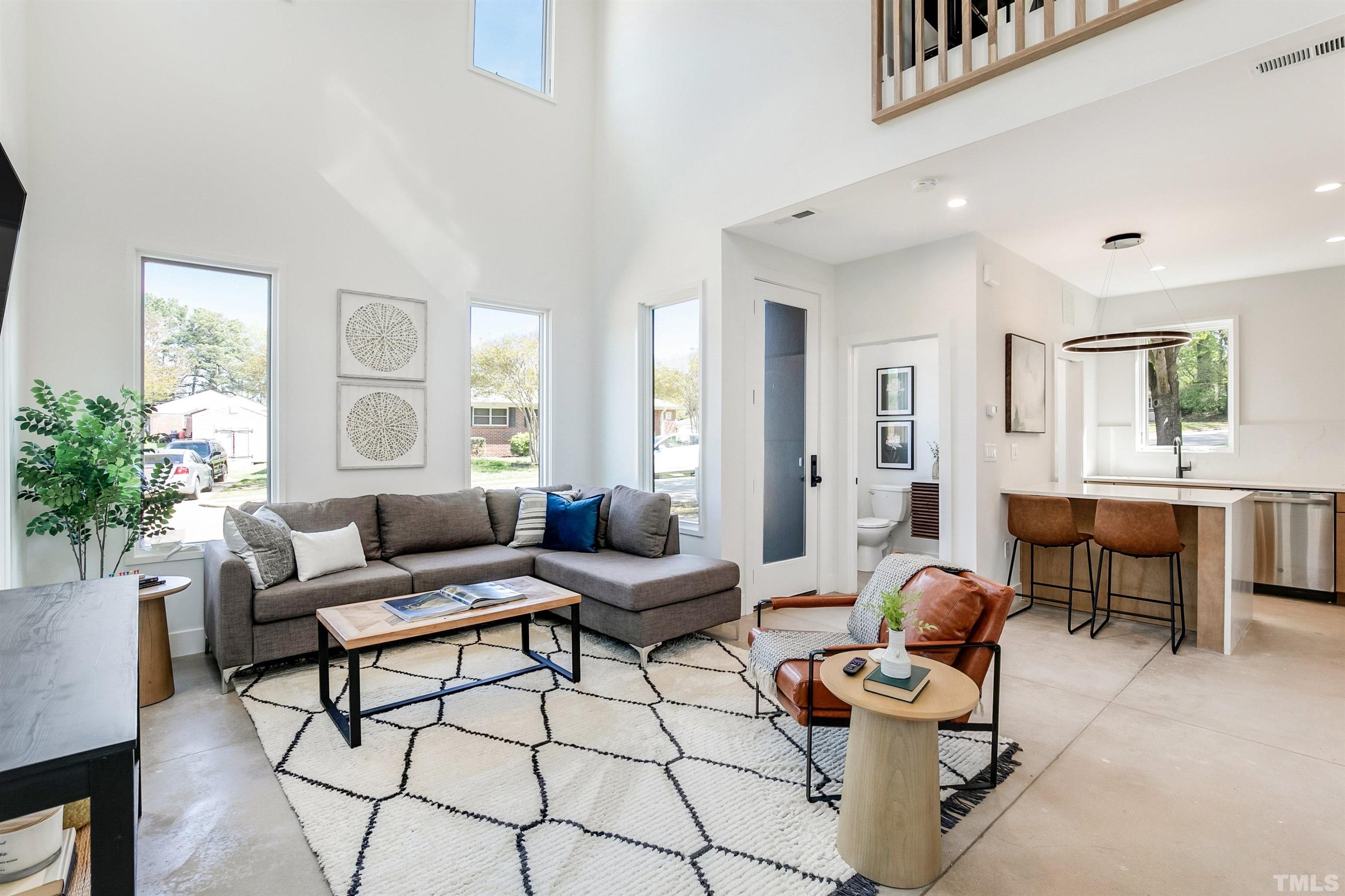 2159 Mayview Drive, Unit B Raleigh, NC 27607 - Photo 13 of 29 a living room with furniture and wooden floor
