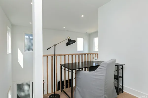 a view of entryway with wooden floor