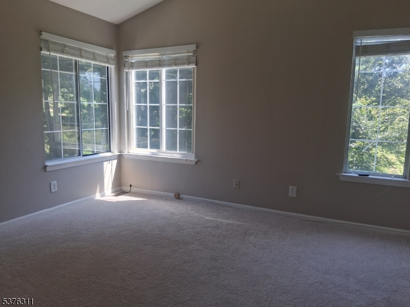 25 Stevens Court Bedminster, NJ 07921 - Photo 15 of 30 an empty room with a window