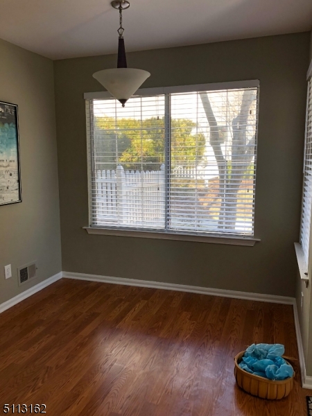 25 Stevens Court Bedminster, NJ 07921 - Photo 9 of 30 a room with wooden floor and a window