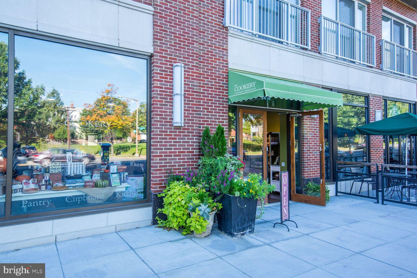 4201 Cathedral Avenue Northwest, Unit 1209W Washington, DC 20016 - Photo 46 of 46 a view of a building with a potted plant