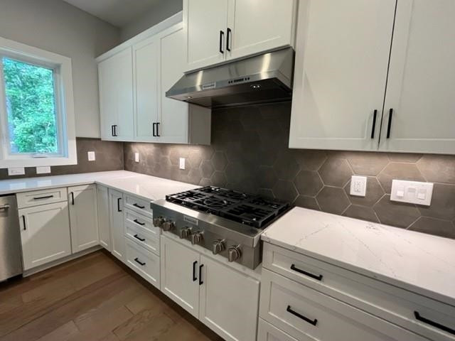 2626 Salient Apex, NC 27523 - Photo 12 of 52 a kitchen with white cabinets and appliances