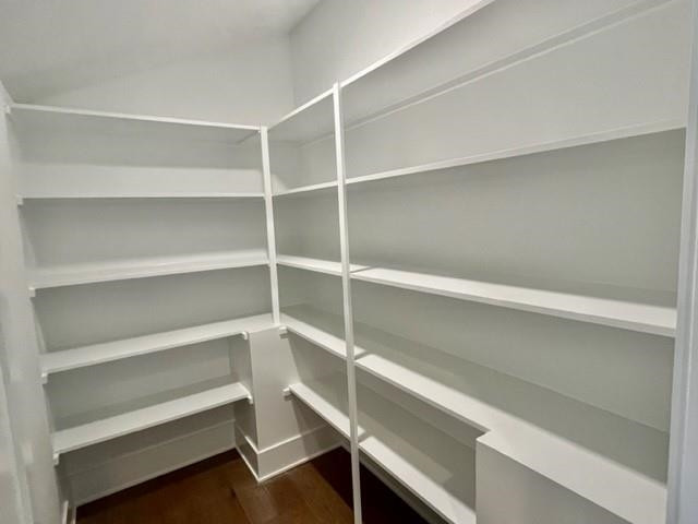 2626 Salient Apex, NC 27523 - Photo 22 of 52 a view of walk in closet with empty racks