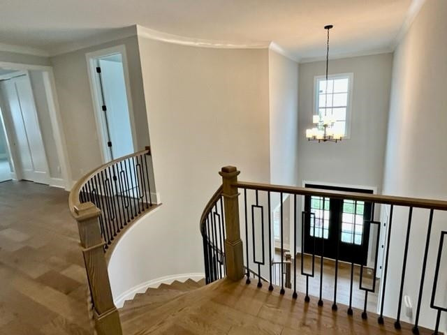 2626 Salient Apex, NC 27523 - Photo 24 of 52 a view of a hallway with wooden floor and stairs
