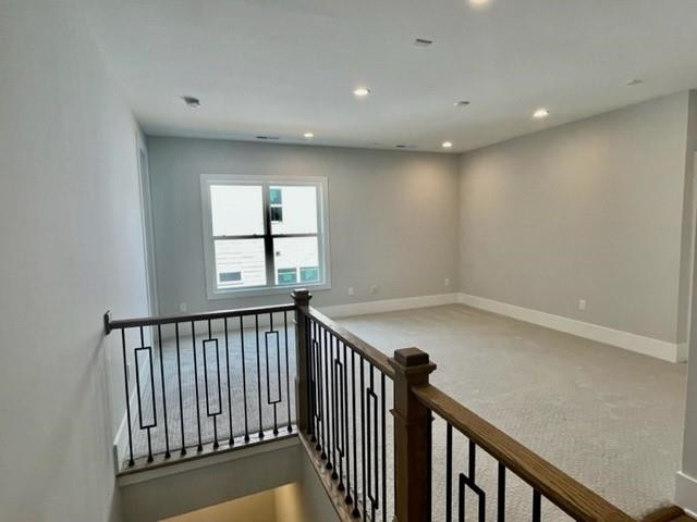 2626 Salient Apex, NC 27523 - Photo 27 of 52 a view of hallway with window and stairs
