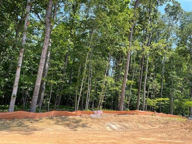 2626 Salient Apex, NC 27523 - Photo 40 of 52 a view of large trees with a house in the background