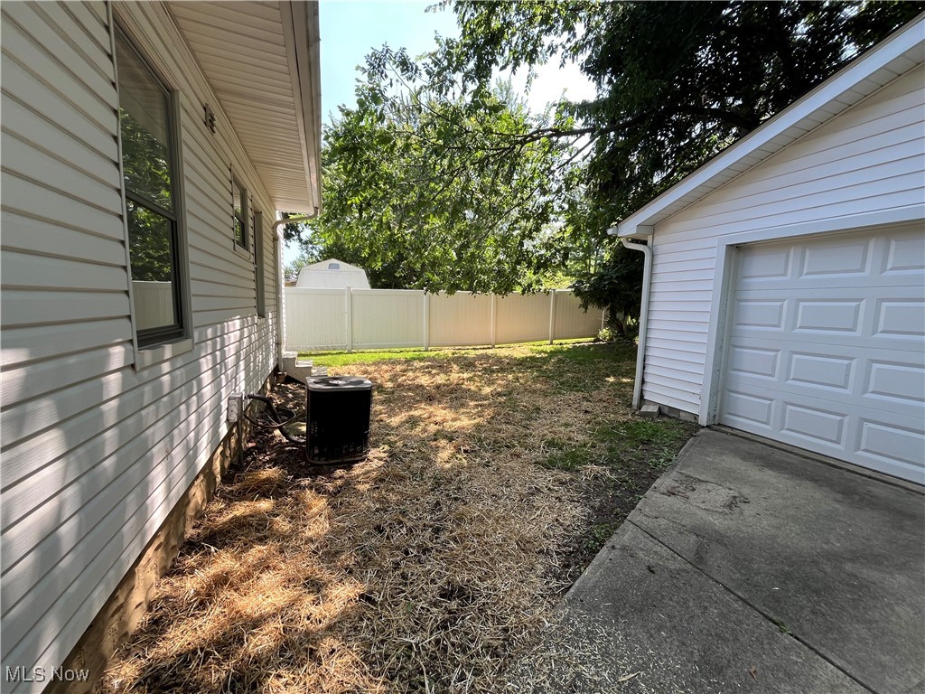 1386 Sunset Road Cleveland, OH 44124 - Photo 20 of 28 View of Back yard from Driveway with Garage.
