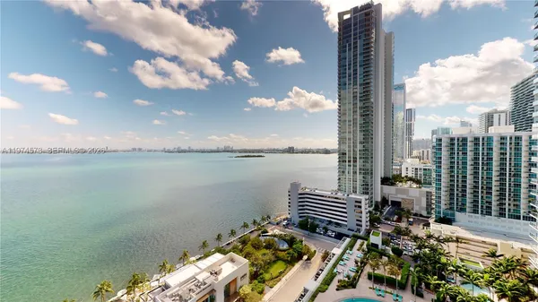 a view of a terrace with lake view and a city view