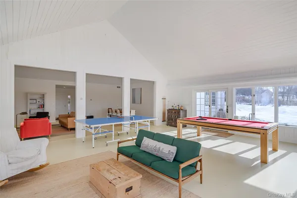 a living room with furniture and a table