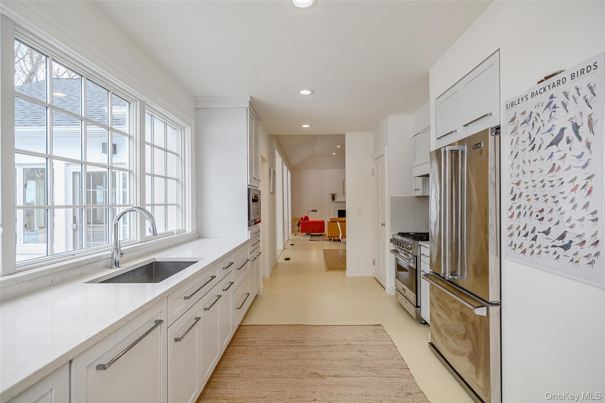 159 Old Quaker Hill Road Pawling, NY 12564 - Photo 19 of 40 Kitchen featuring white cabinets, high end appliances, light stone countertops, and recessed lighting