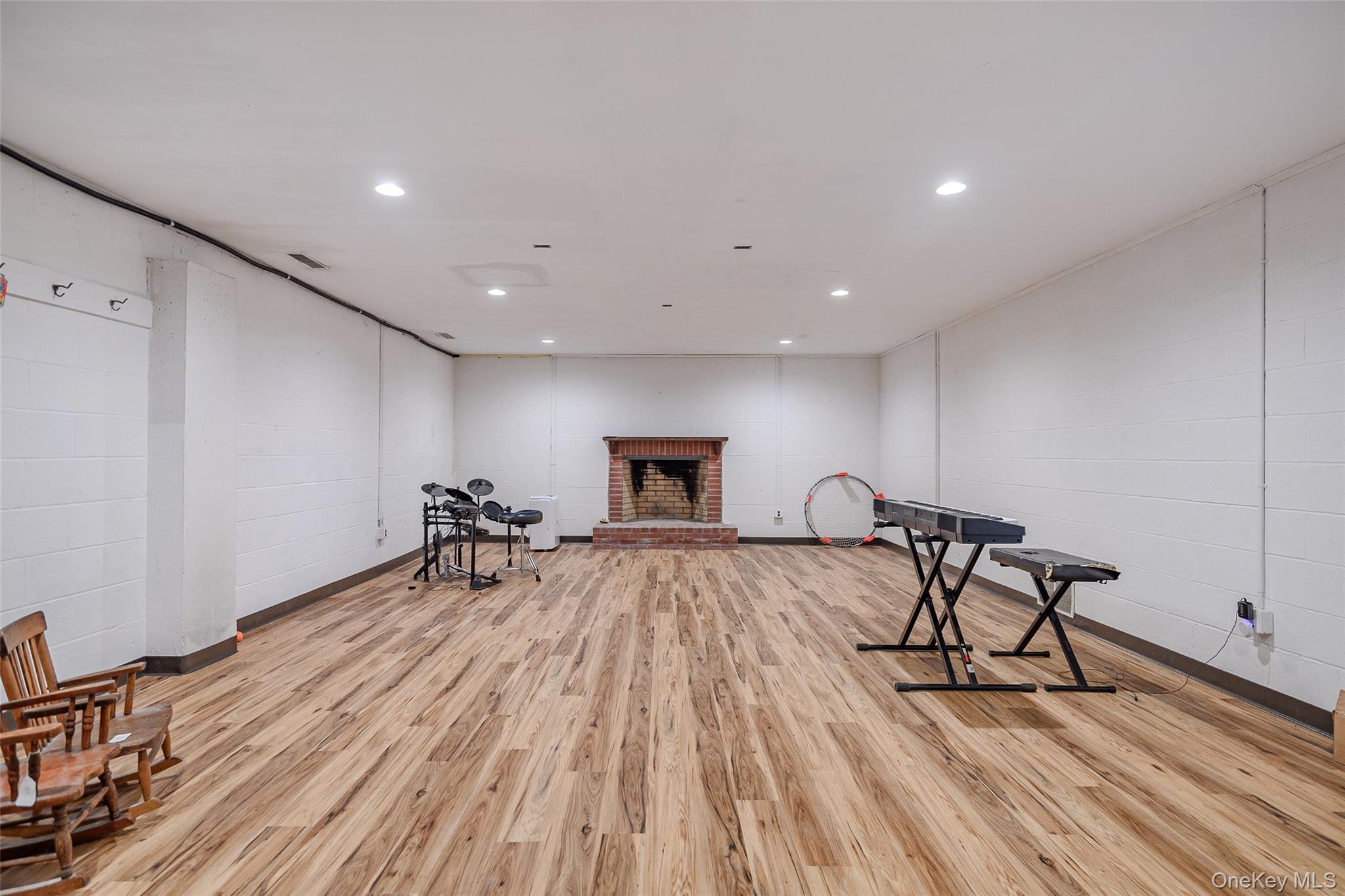 159 Old Quaker Hill Road Pawling, NY 12564 - Photo 29 of 40 Sitting room with a fireplace and recessed lighting