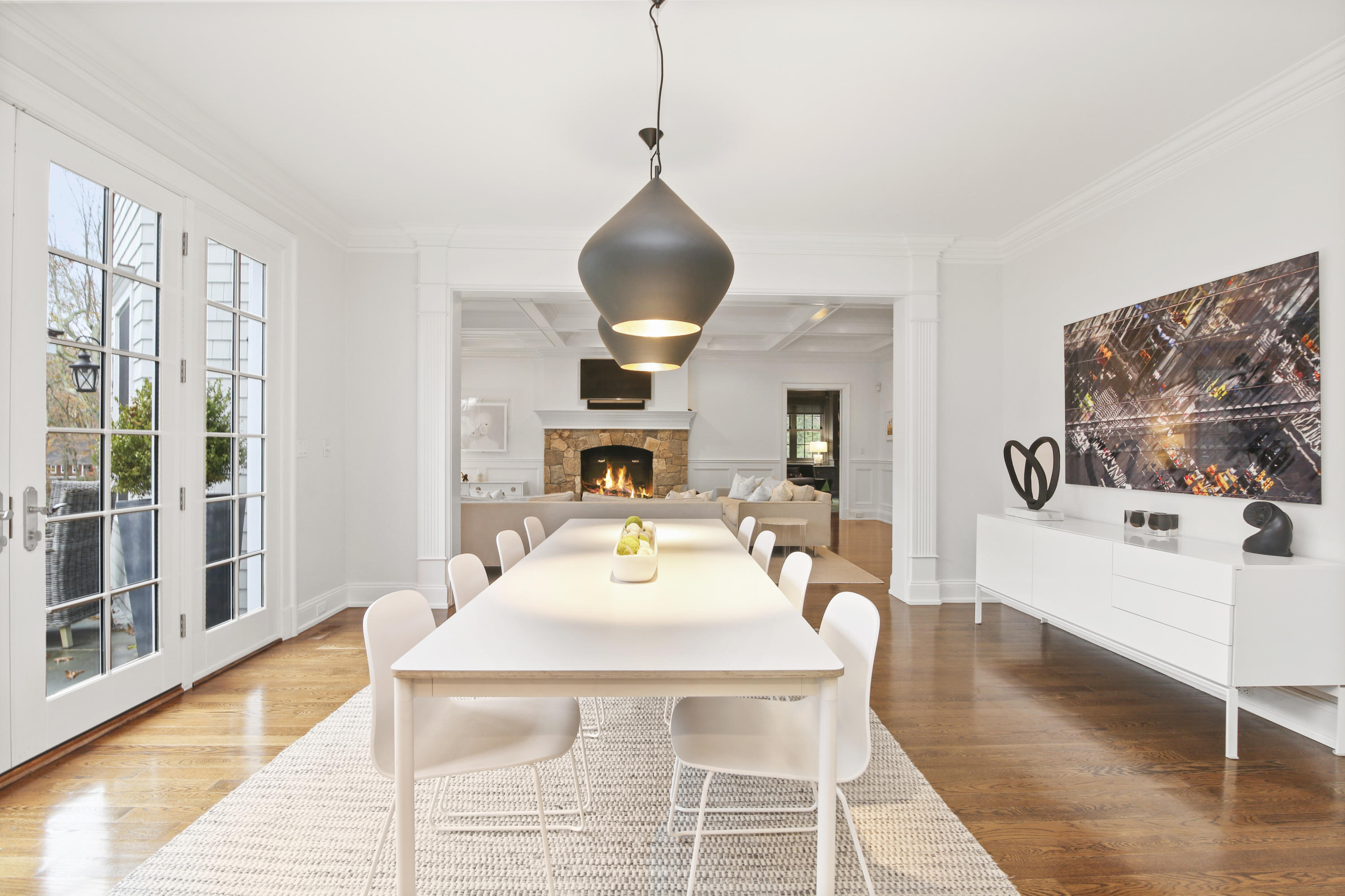 121 Chichester Road New Canaan, CT 06840 - Photo 18 of 42 a living room with fireplace furniture and a wooden floor
