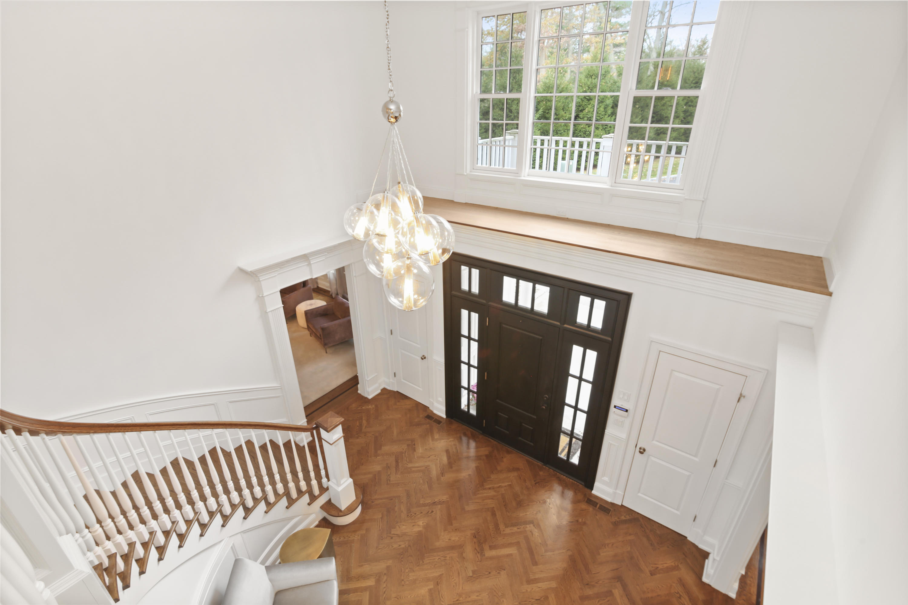 121 Chichester Road New Canaan, CT 06840 - Photo 21 of 42 a view of an entryway door with a staircase