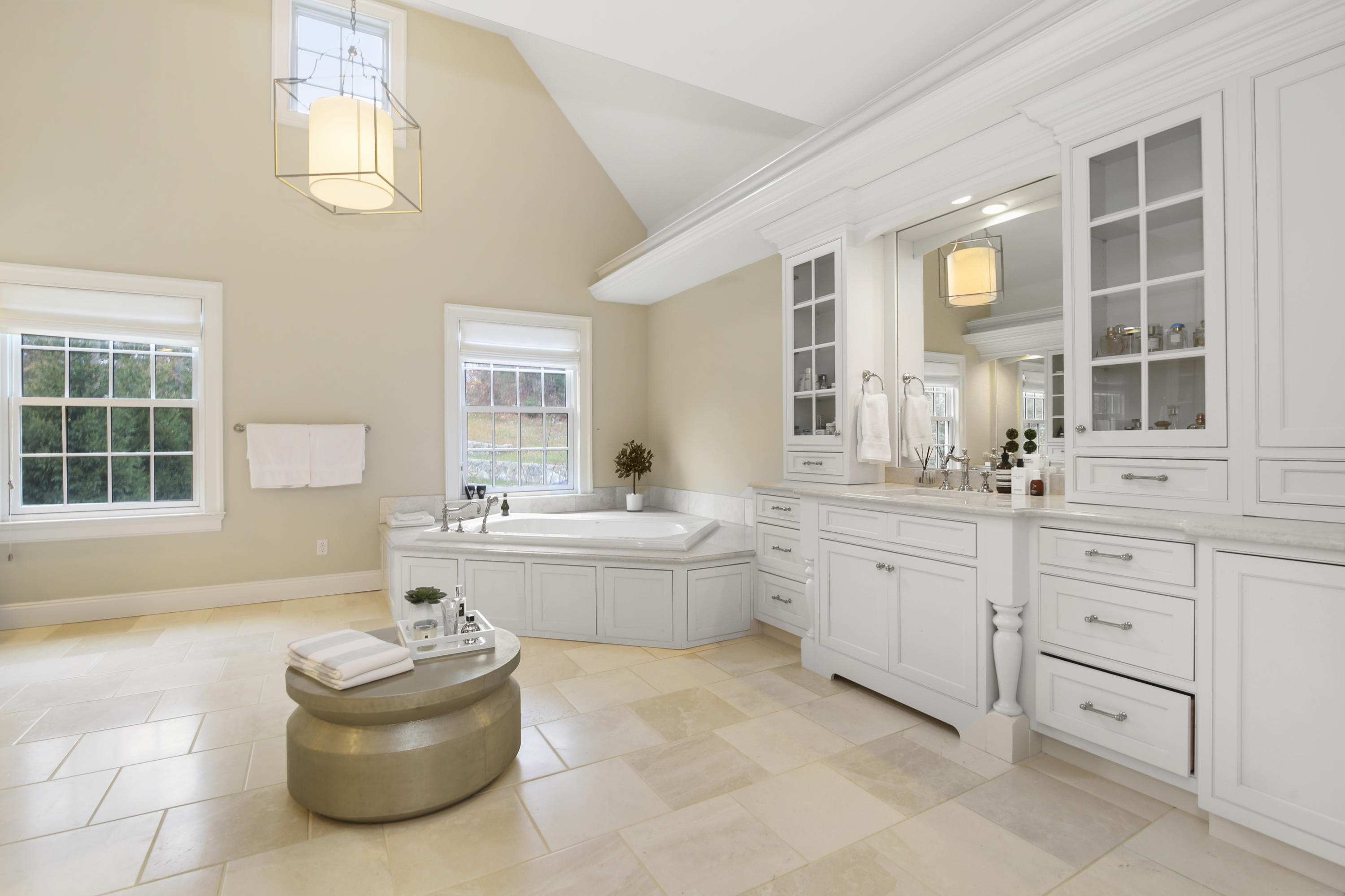 121 Chichester Road New Canaan, CT 06840 - Photo 25 of 42 a bathroom with a granite countertop tub sink and mirror