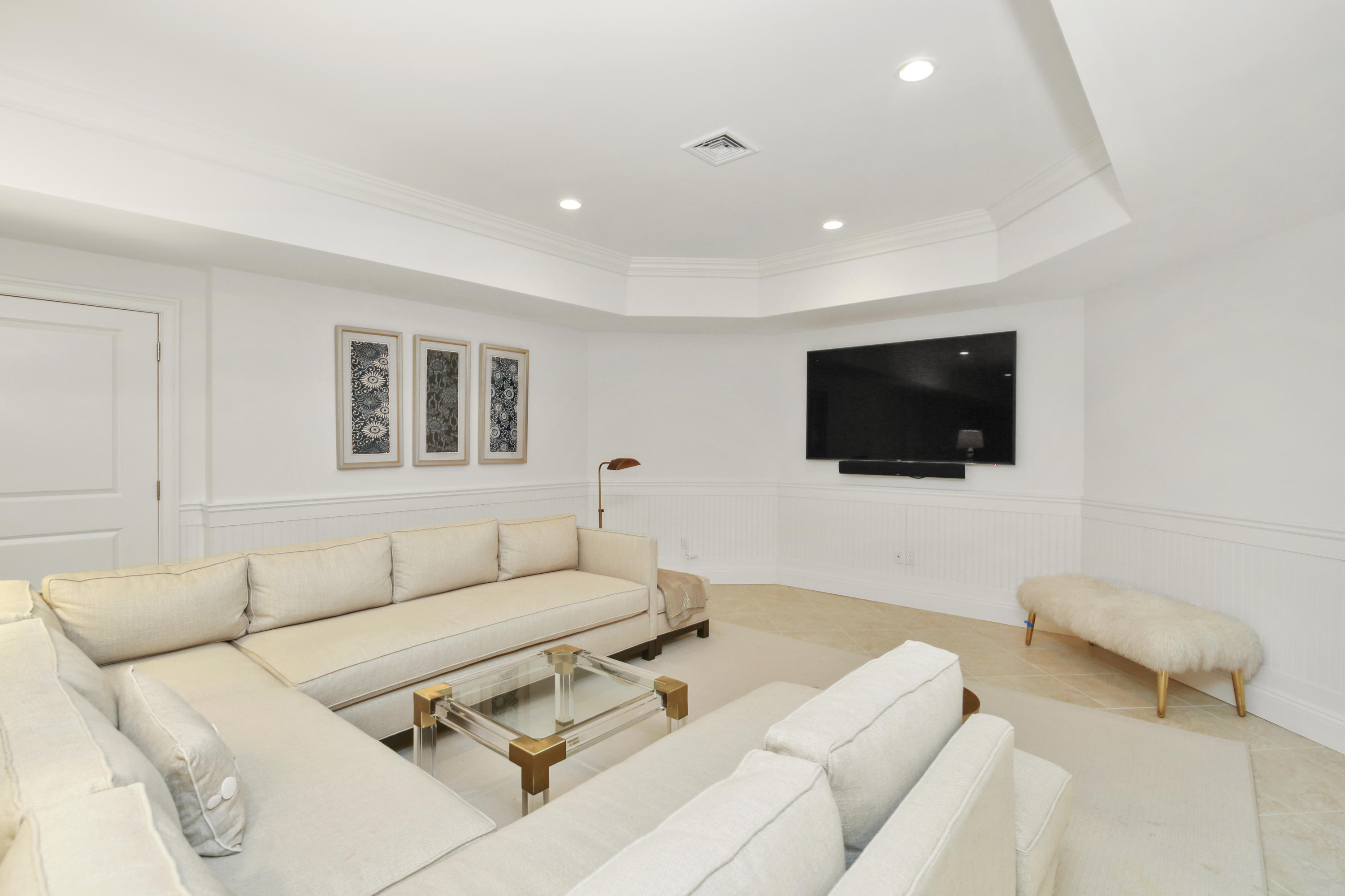 121 Chichester Road New Canaan, CT 06840 - Photo 34 of 42 a living room with furniture and a flat screen tv