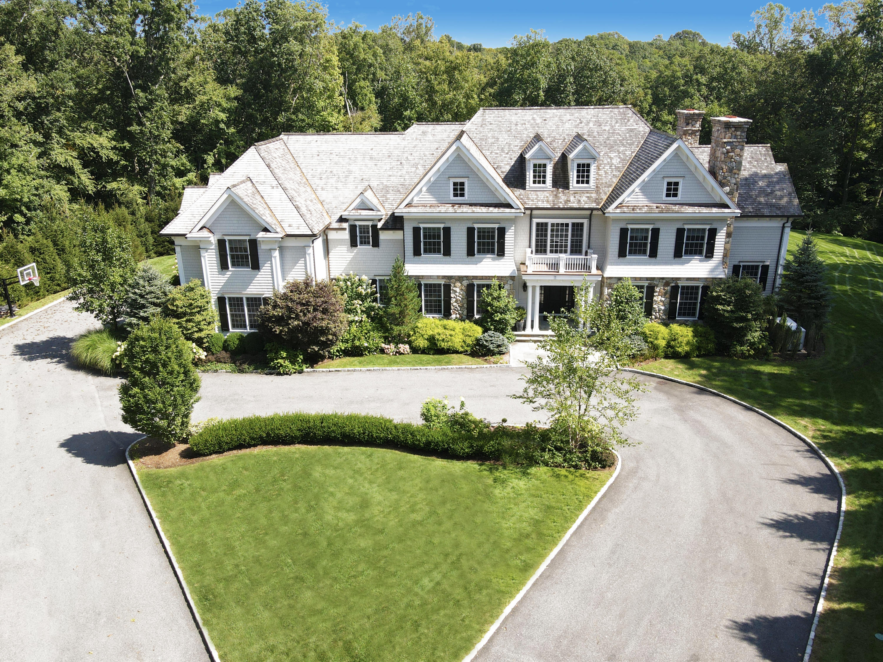 121 Chichester Road New Canaan, CT 06840 - Photo 38 of 42 a aerial view of a house with garden