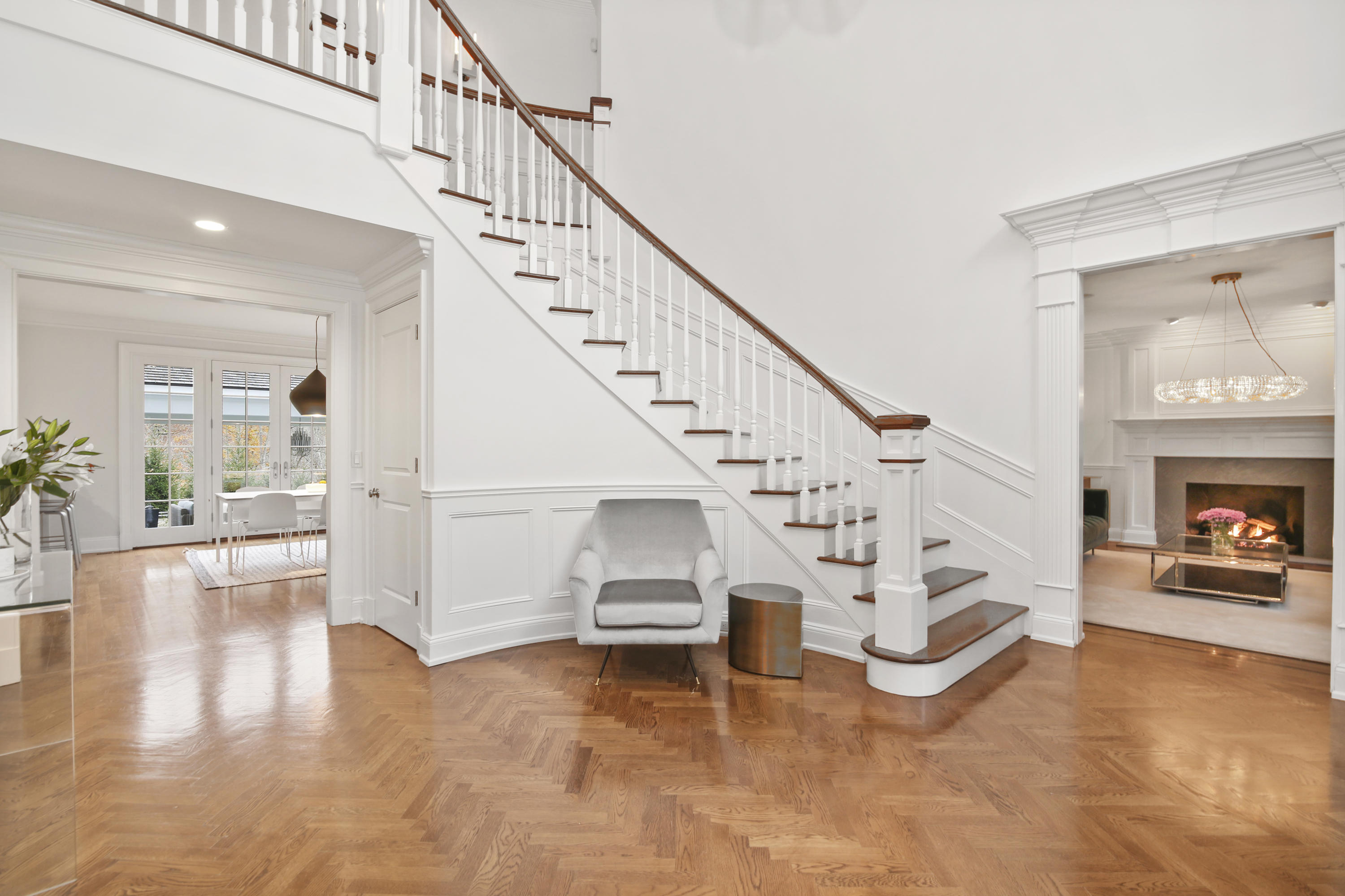 121 Chichester Road New Canaan, CT 06840 - Photo 6 of 42 a view of entryway and hall with wooden floor