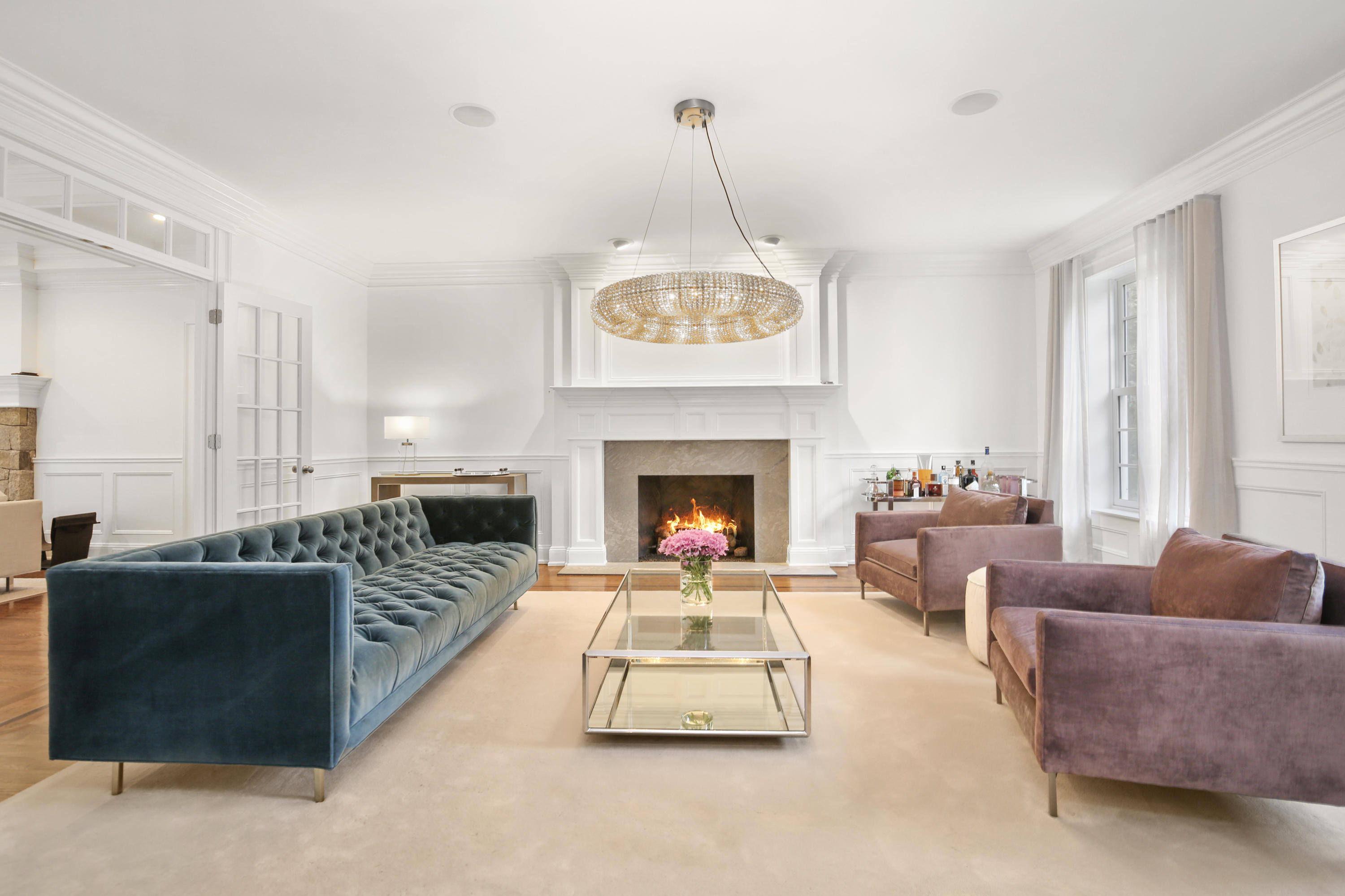 121 Chichester Road New Canaan, CT 06840 - Photo 7 of 42 a living room with furniture and a fireplace