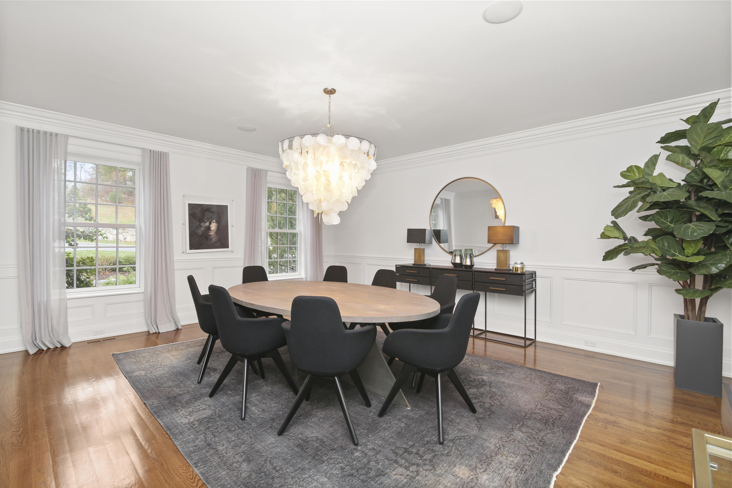 121 Chichester Road New Canaan, CT 06840 - Photo 8 of 42 a view of a dining room with furniture window and wooden floor