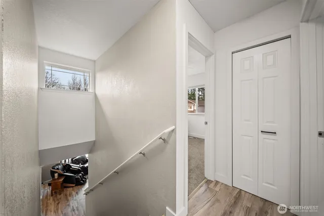 a view of a hallway with closet