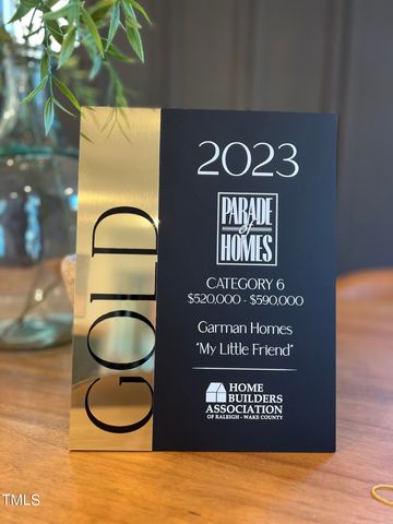 a view of a dining room and a table and chairs