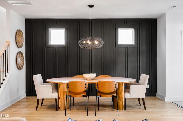 a bed room with a bed and a table