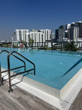 a view of a terrace with sitting area