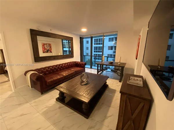 a living room with furniture and a couch