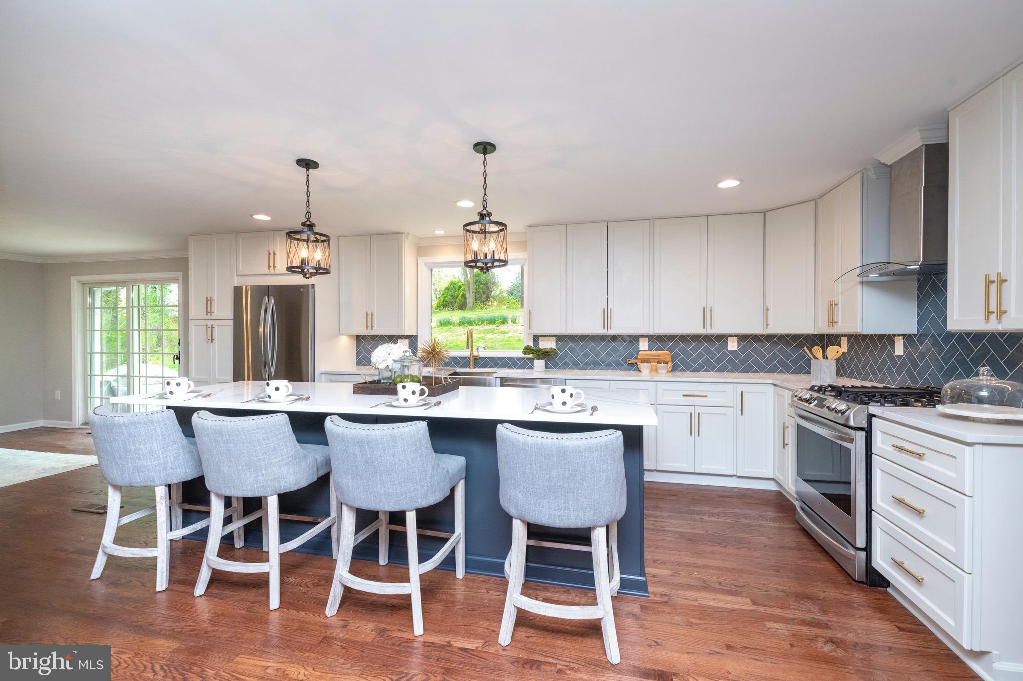 2210 Pot Spring Road Lutherville-Timonium, MD 21093 - Photo 11 of 59 Custom cabinets with island in dark gray