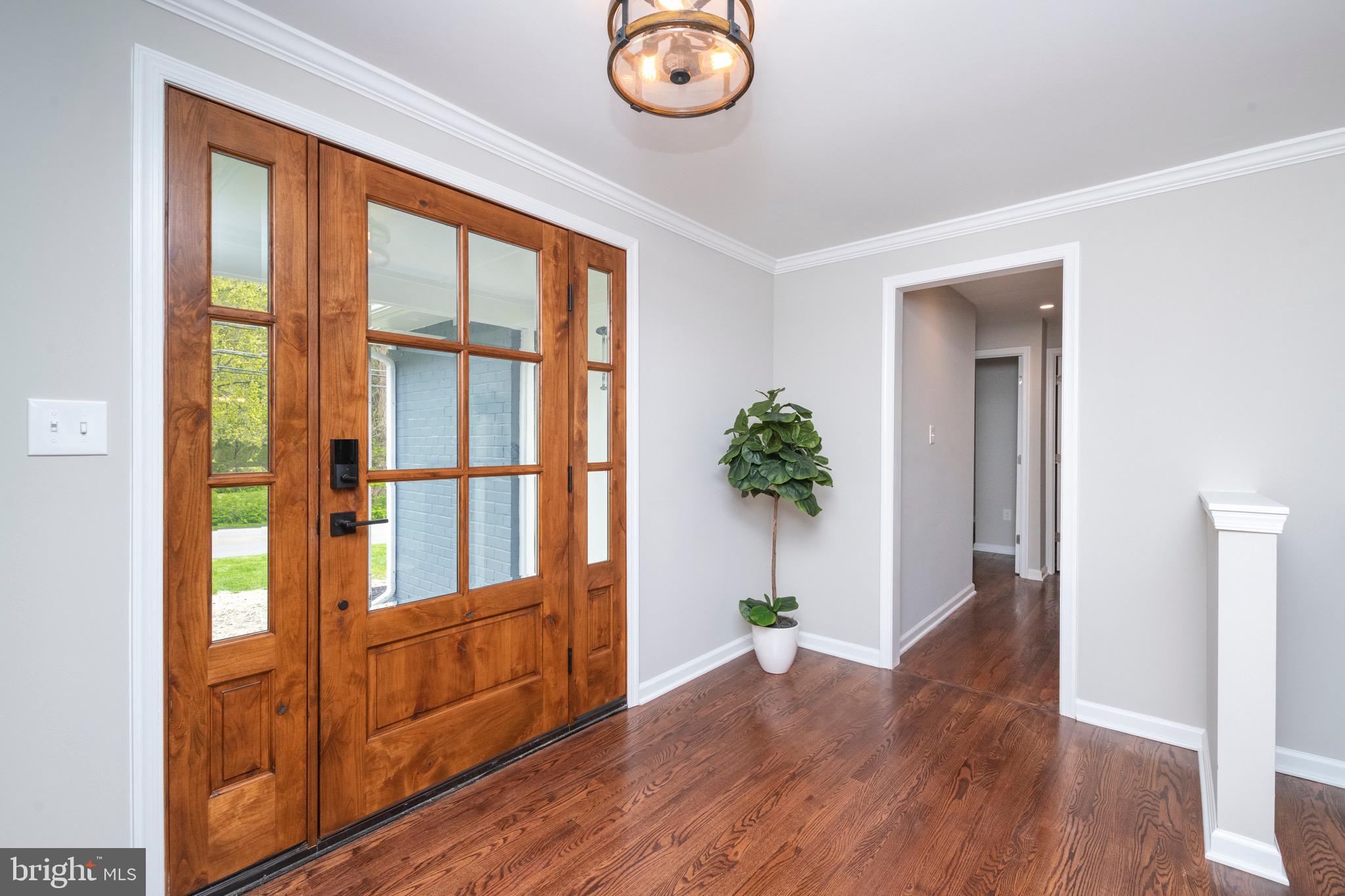 2210 Pot Spring Road Lutherville-Timonium, MD 21093 - Photo 3 of 59 Spacious Foyer accents New Alder Wood Front Door
