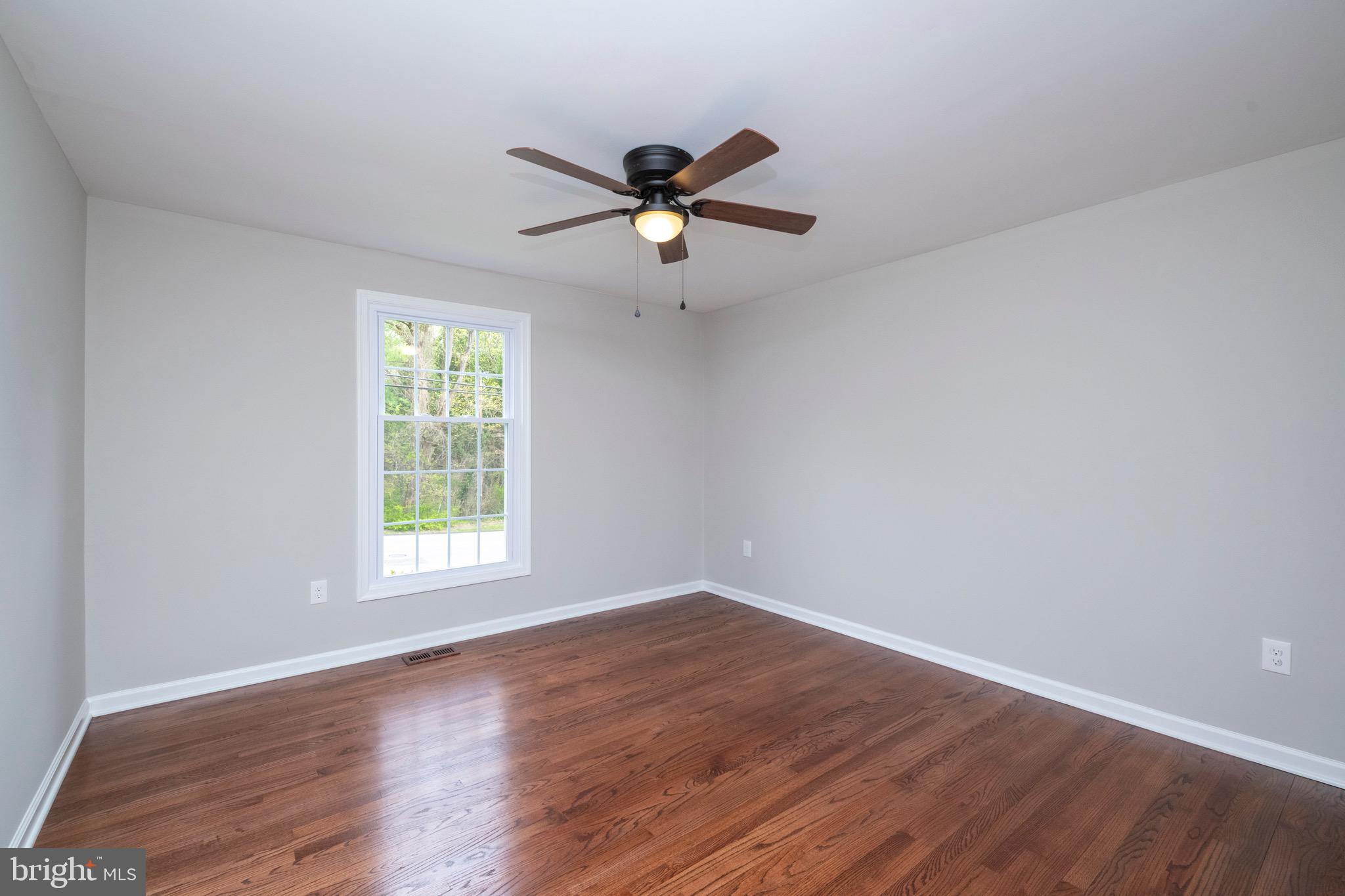 2210 Pot Spring Road Lutherville-Timonium, MD 21093 - Photo 27 of 59 Airy Front Bedroom #2 with Ceiling Fan