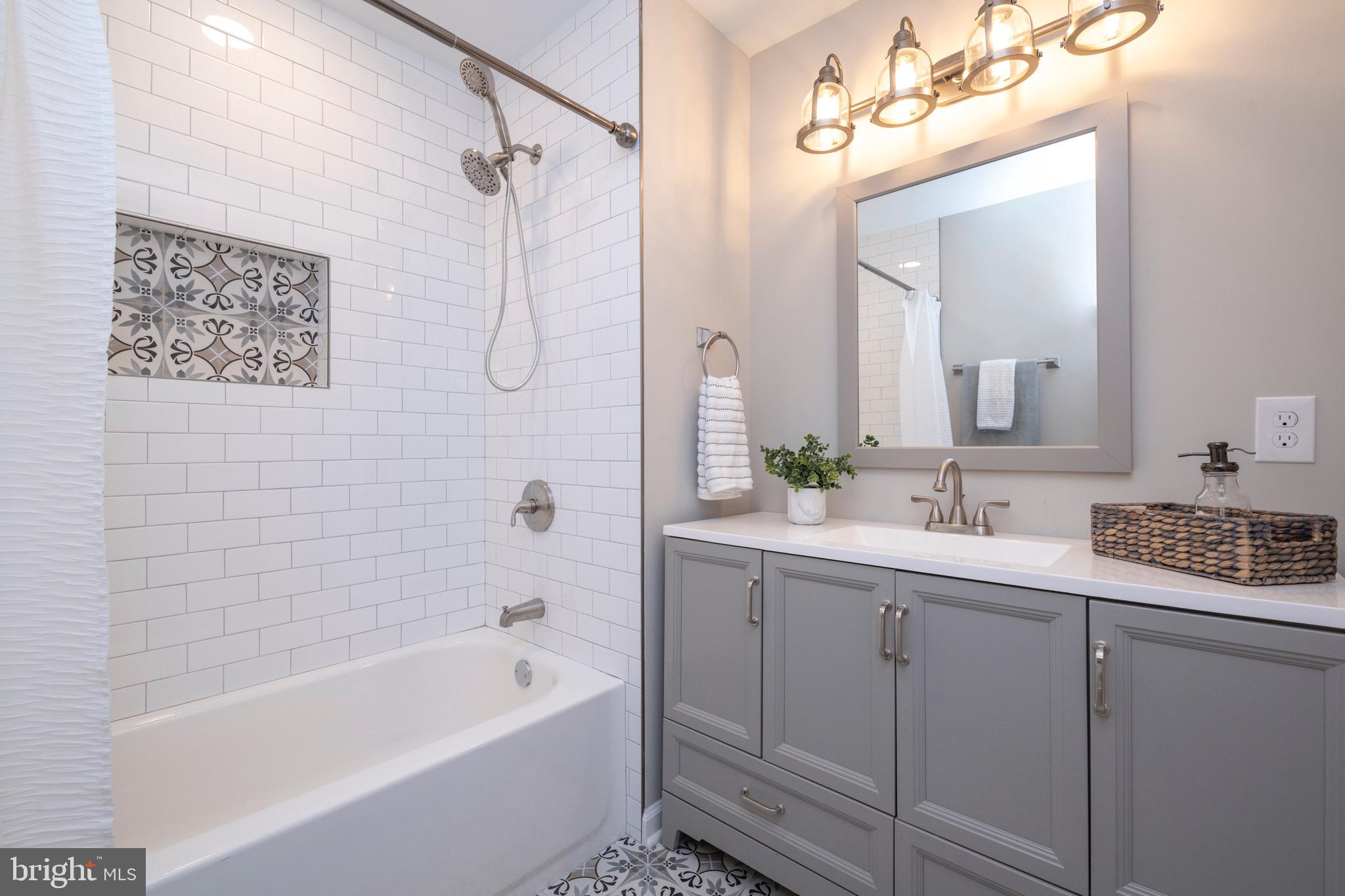 2210 Pot Spring Road Lutherville-Timonium, MD 21093 - Photo 29 of 59 Hall Bath with custom tile & large vanity