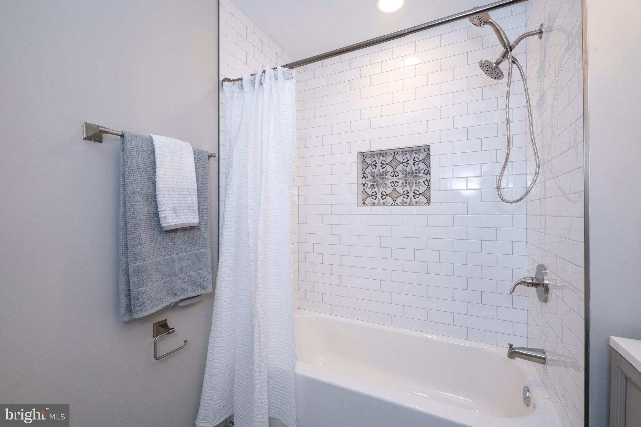 2210 Pot Spring Road Lutherville-Timonium, MD 21093 - Photo 30 of 59 All New Hall Bath with dual shower heads & inset