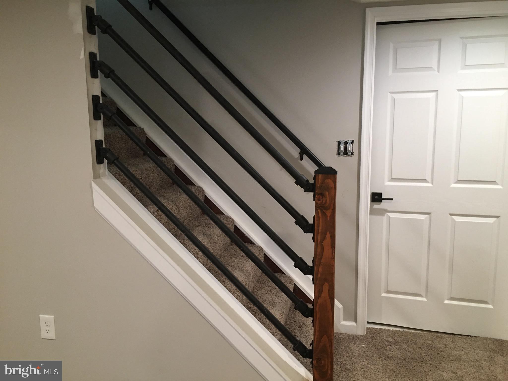 2210 Pot Spring Road Lutherville-Timonium, MD 21093 - Photo 35 of 59 Custom Rails & Post Leading to Family Room