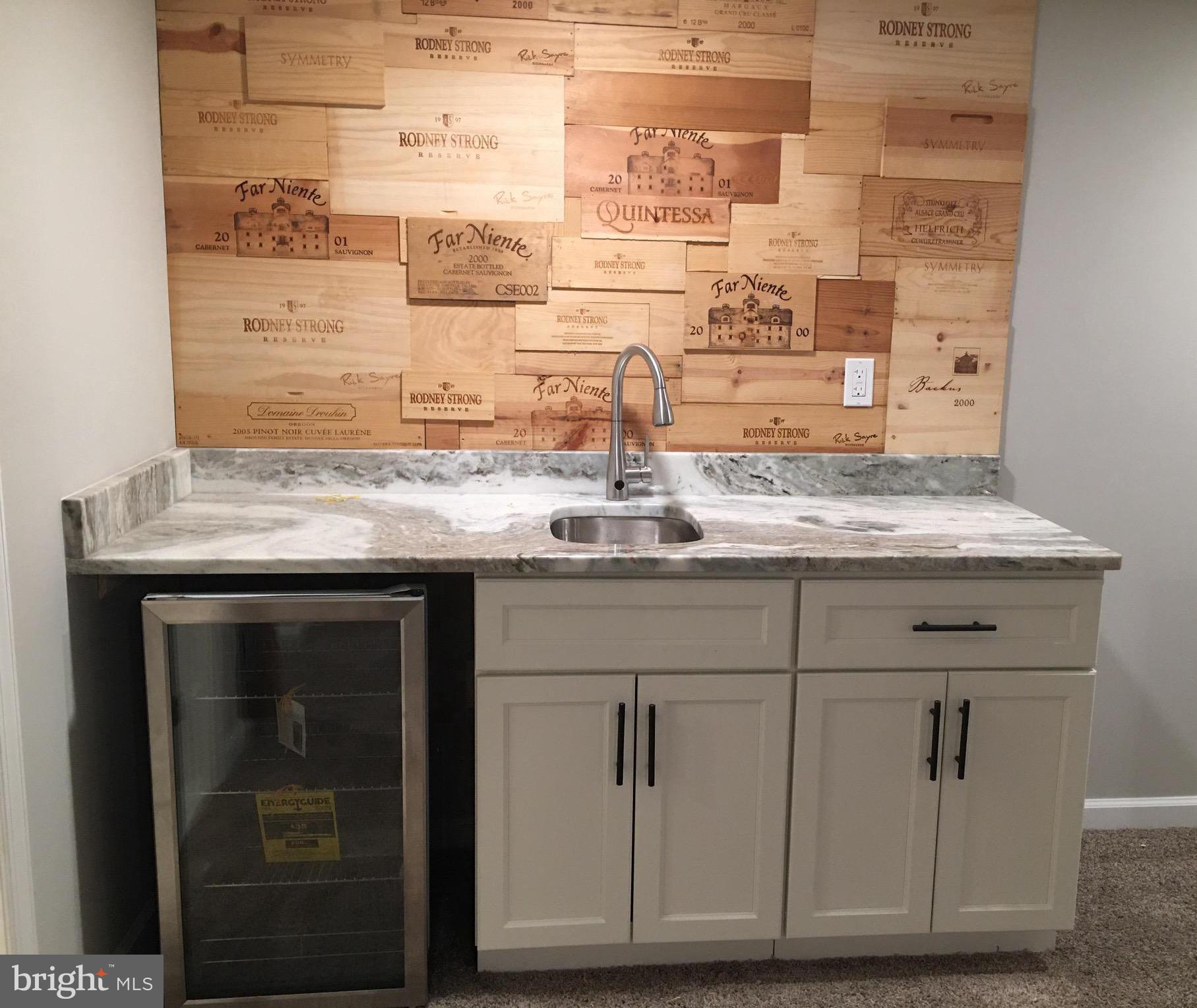 2210 Pot Spring Road Lutherville-Timonium, MD 21093 - Photo 38 of 59 Wet Bar with Min Fridge & Custom Marble Counter!