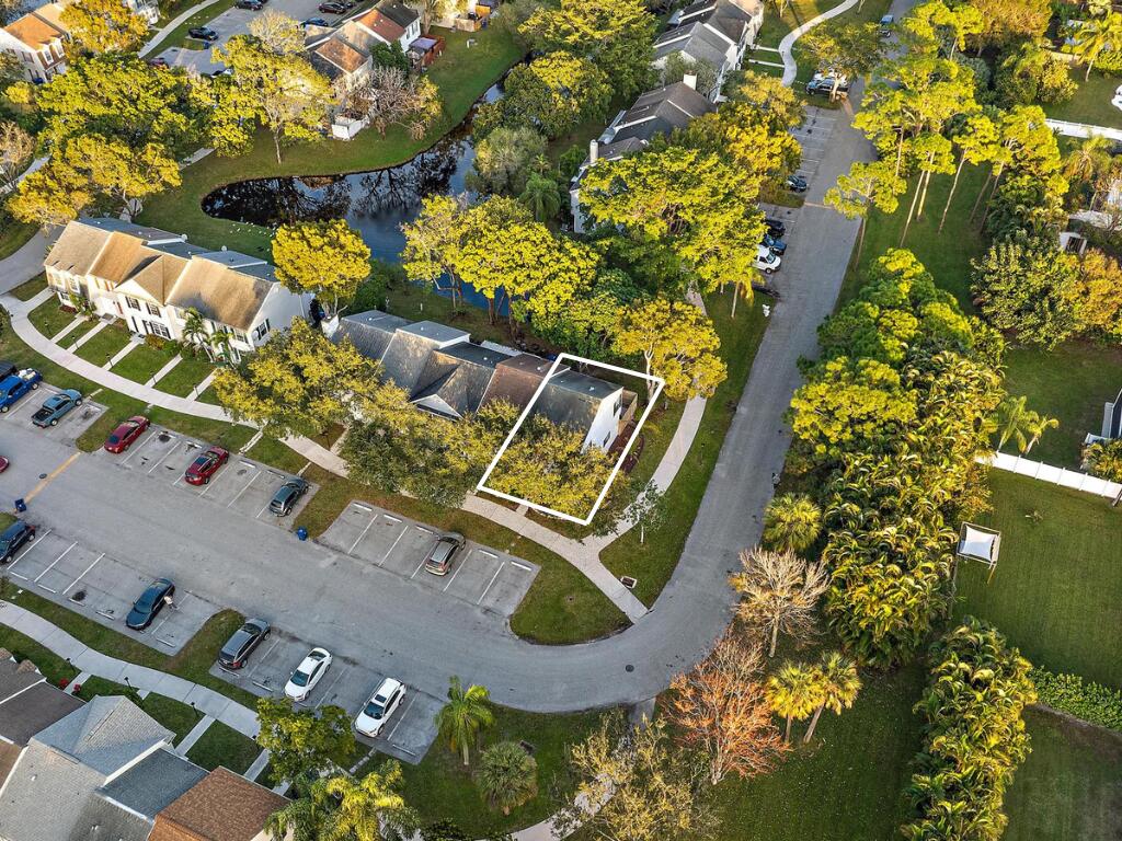 301 Georgian Park Drive Jupiter, FL 33458 - Photo 31 of 33 view of a house with a yard