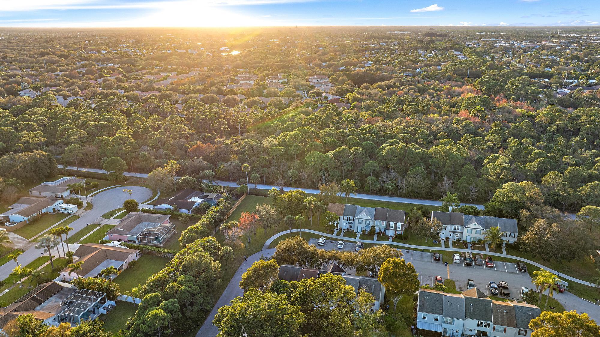 301 Georgian Park Drive Jupiter, FL 33458 - Photo 32 of 33 an aerial view of multiple house