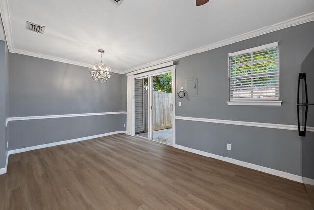 301 Georgian Park Drive Jupiter, FL 33458 - Photo 8 of 33 a view of an empty room with a window