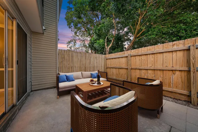 a backyard of a house with seating space