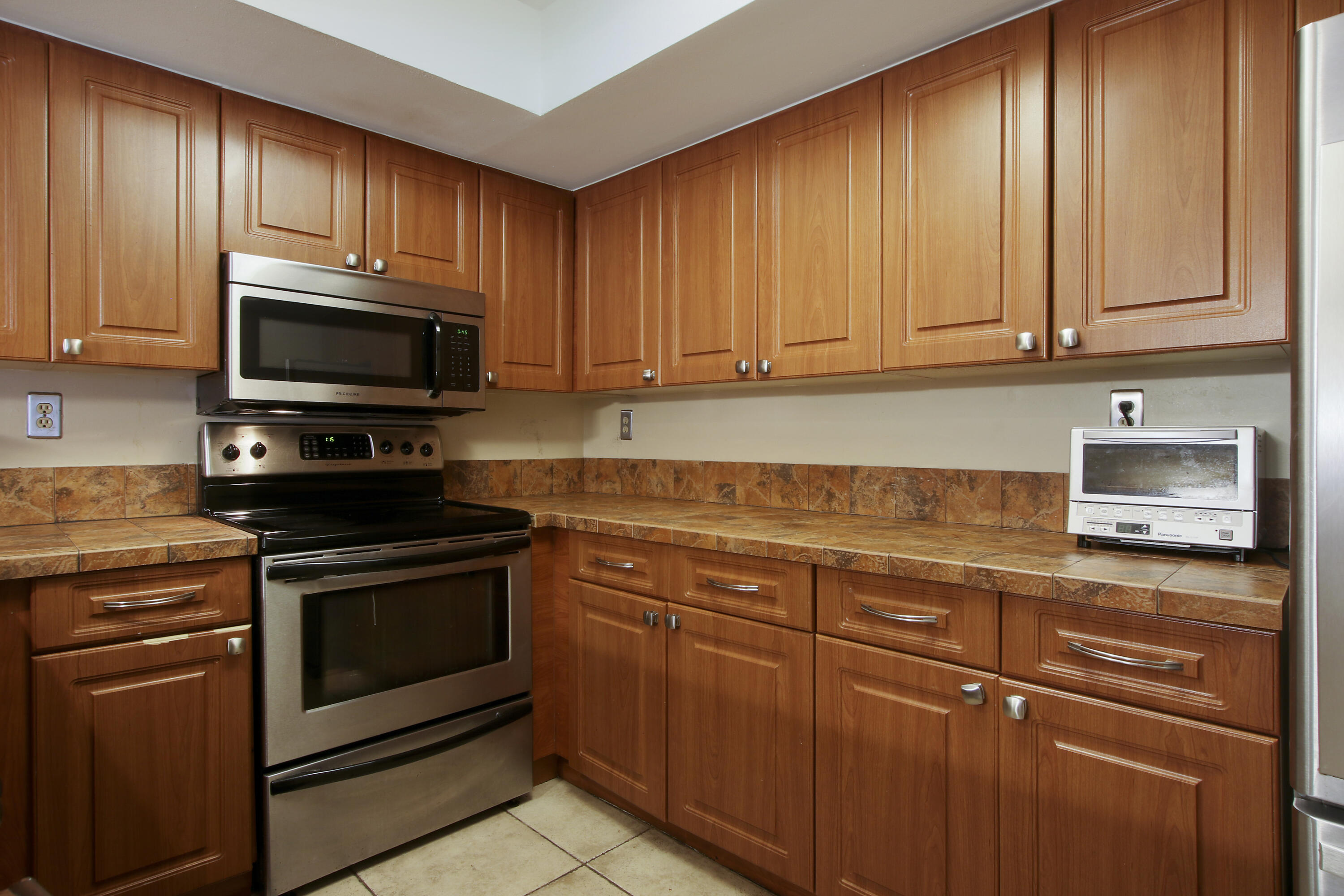 5355 Buckhead Circle, Unit 1020 Boca Raton, FL 33431 - Photo 9 of 36 Kitchen - lots of cabinet space!
