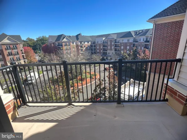a view of balcony with furniture