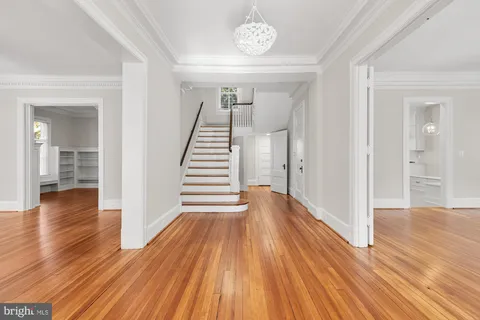 a view of entryway with wooden floor