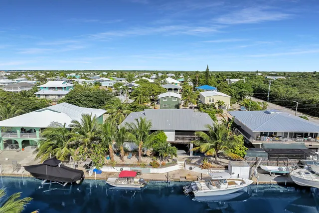 an outdoor space with furniture and city view