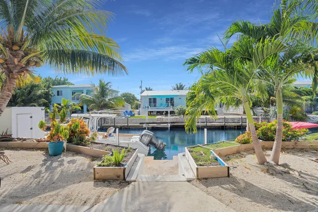 a view of swimming pool with outdoor seating