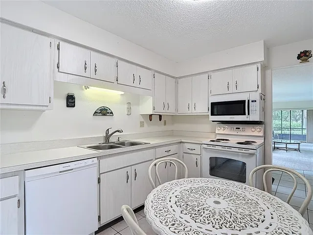 a bathroom with a shower and a mirror
