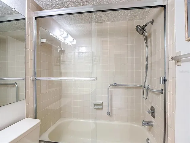 an aerial view of a house with a swimming pool