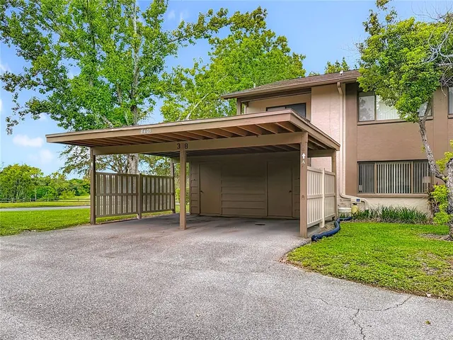 an aerial view of a house with a garden