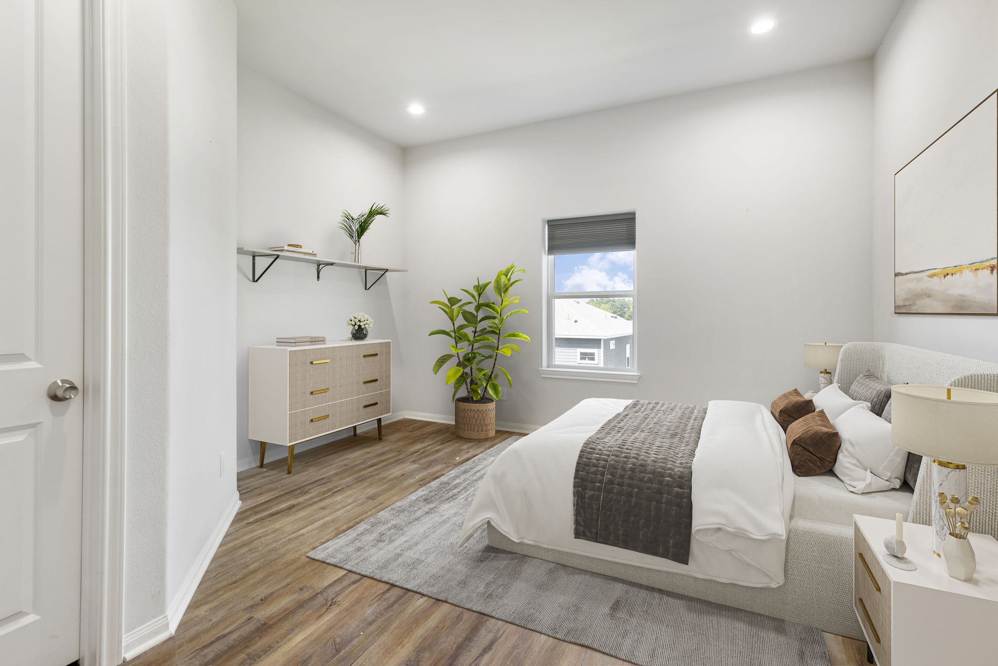 Welcome home to 4908 Paradigm Lane. Primary bedroom  (Virtually Staged)