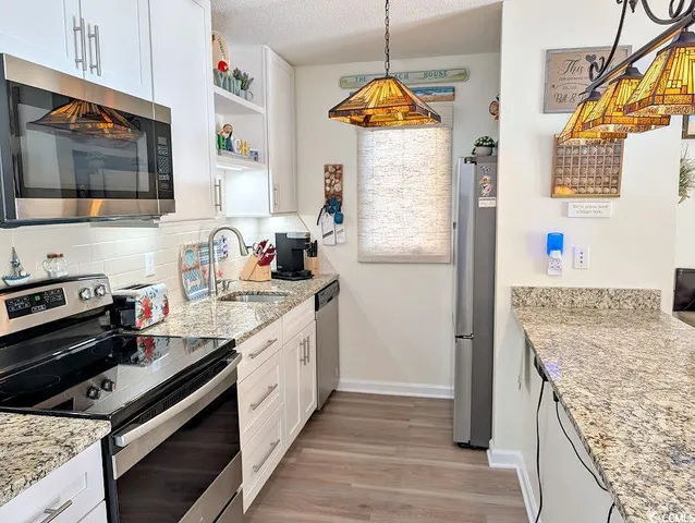 $224,900 | 207 Double Eagle Drive, Unit A1, Surfside Beach, SC 29575